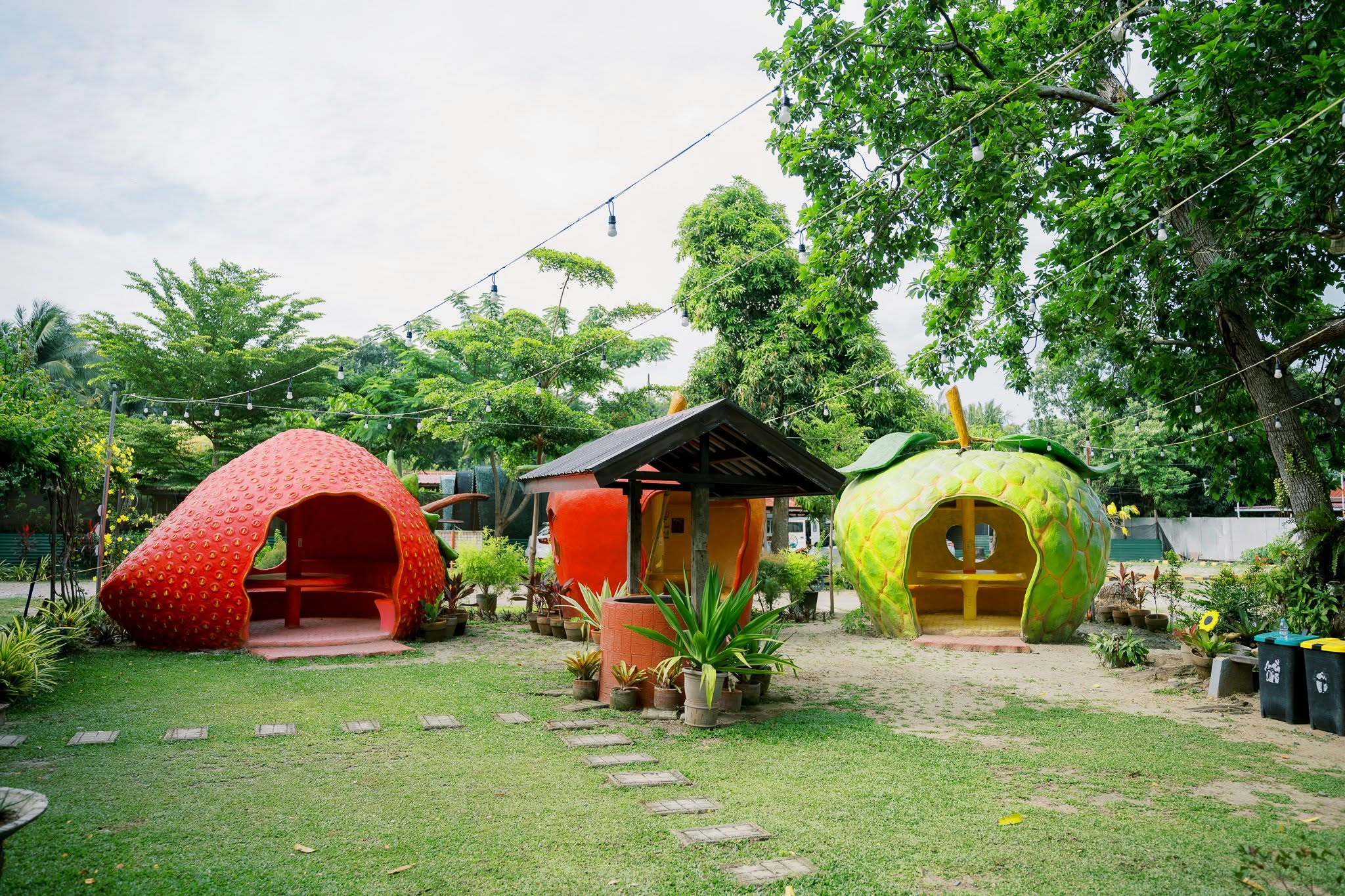 Fruit-themed cottages in a row