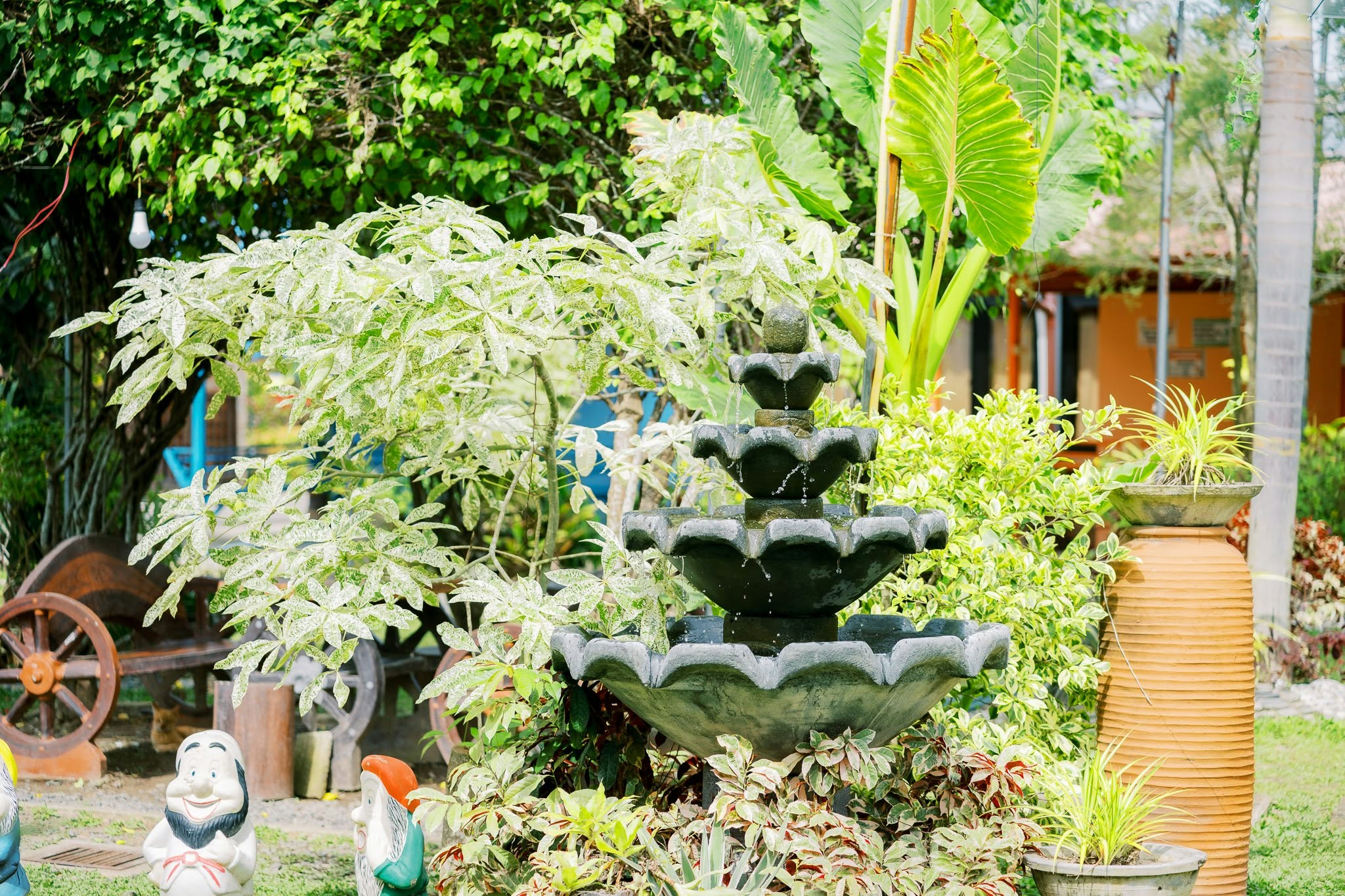 Tiered garden fountain with friendly gnomes